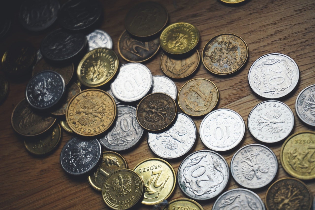 close up of coins from around the world