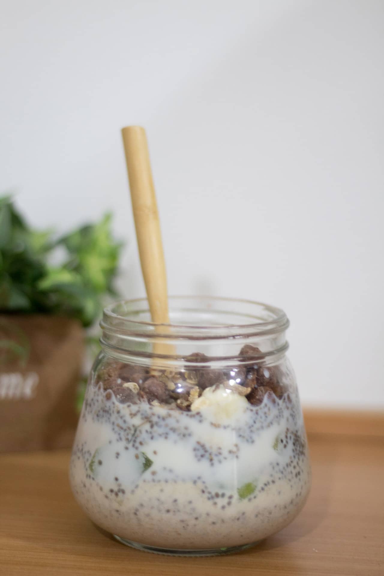 oat milk drink in clear glass jar